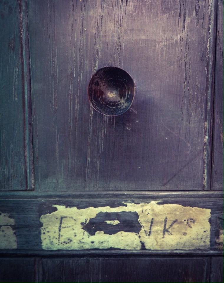 Guildhall, Lavenham. Abstract digital photograph of old railway ticket box.