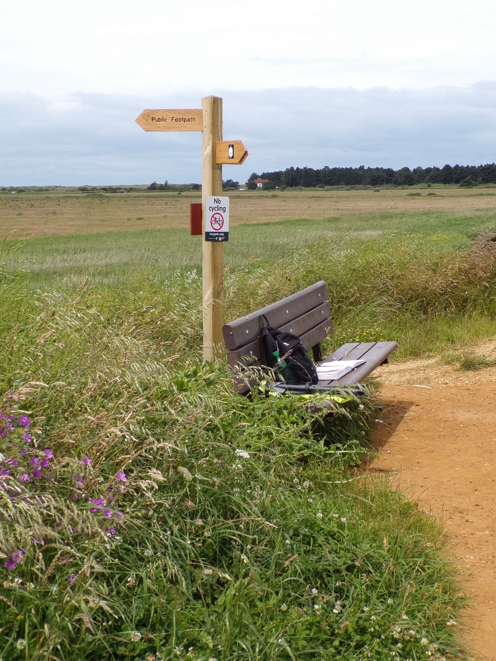 Bench & signpost. &copy; Mari French 2016