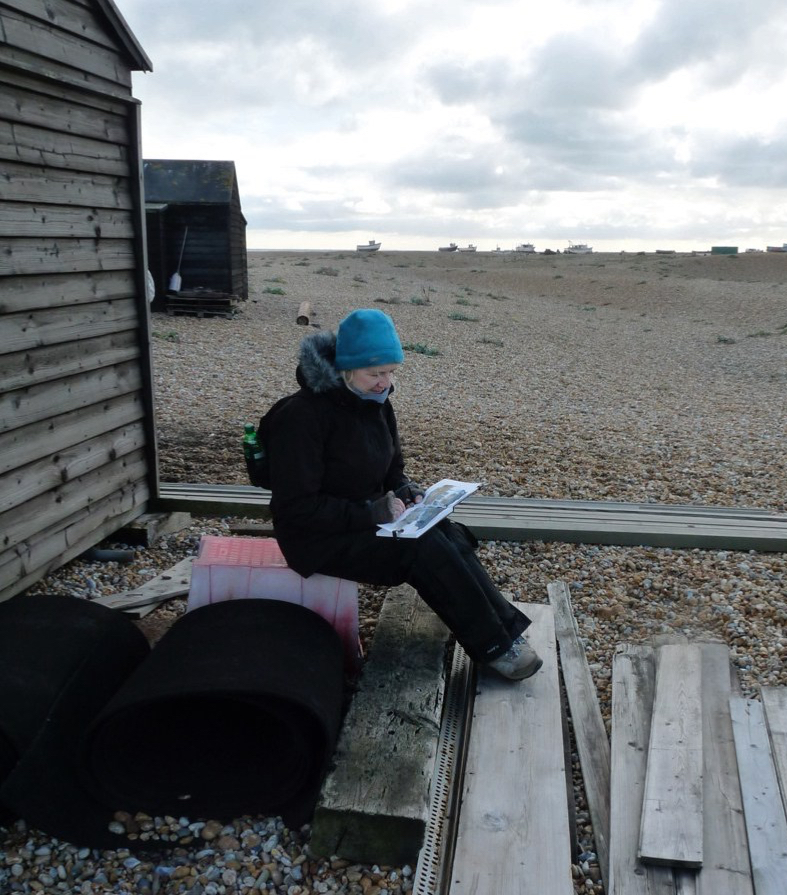 Sketching in the lee of a fishing hut, Dungeness. © Mari French 2018